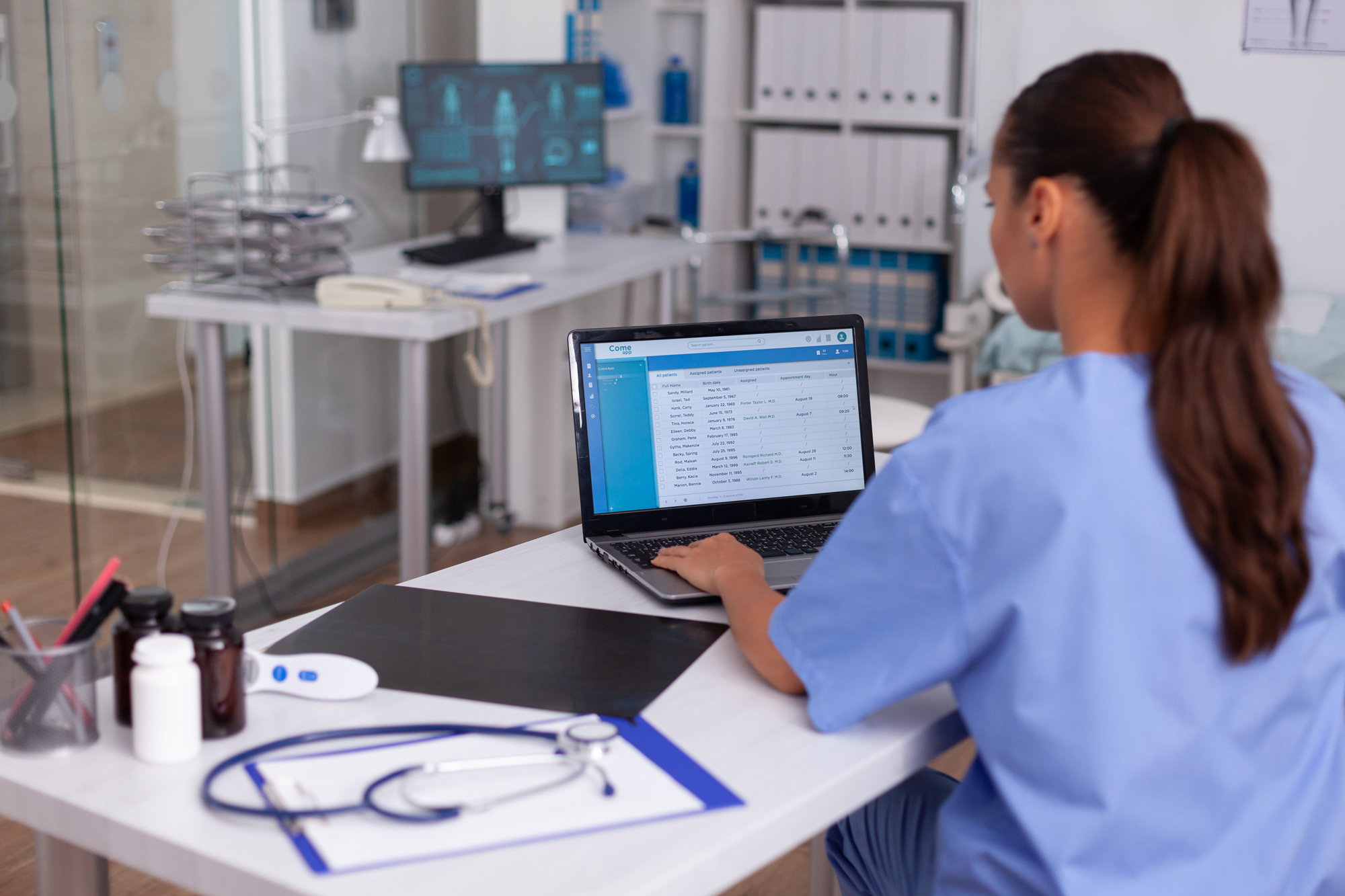 Medical nurse checking patient documentation