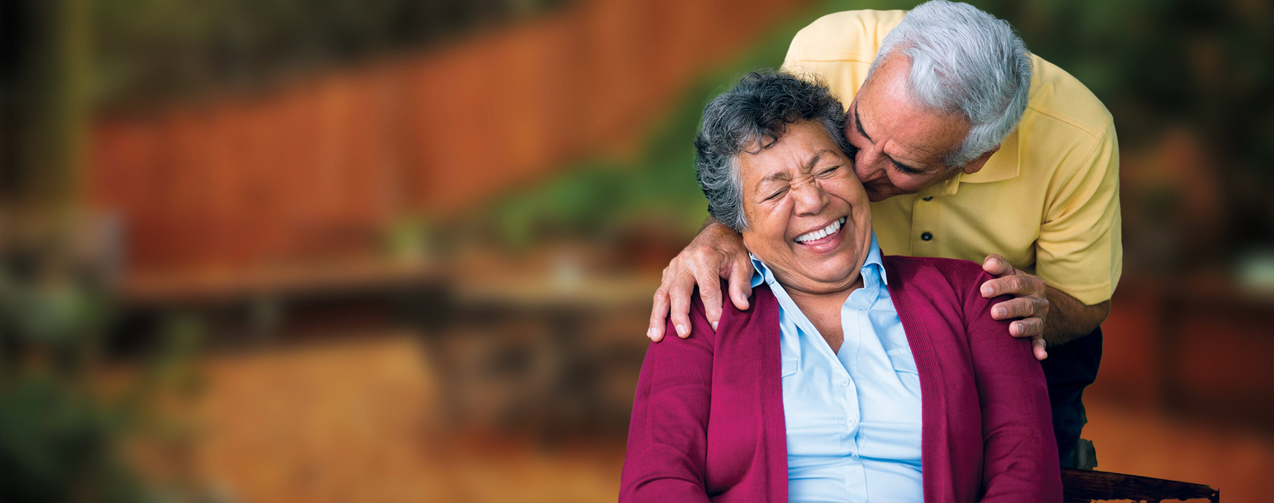 Smiling senior in New York consulting with a doctor about MetroPlusHealth Medicare UltraCare (HMO D-SNP) Plan benefits.